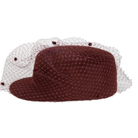 Lady G - Gladys Tamez Millinery